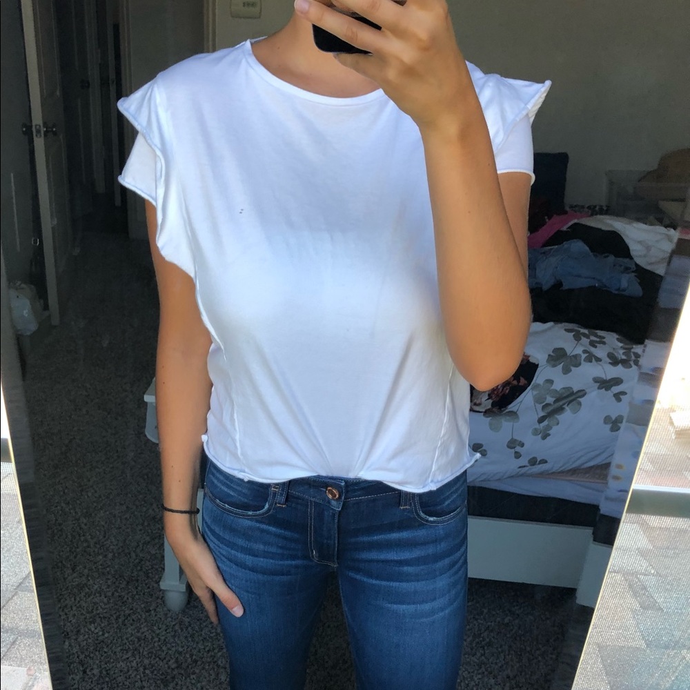 White tee with ruffled shoulders